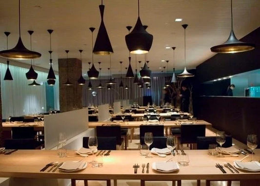 Copper-coloured metal pendant lights