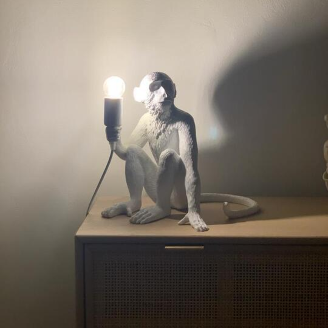 Monkey seated table lamp