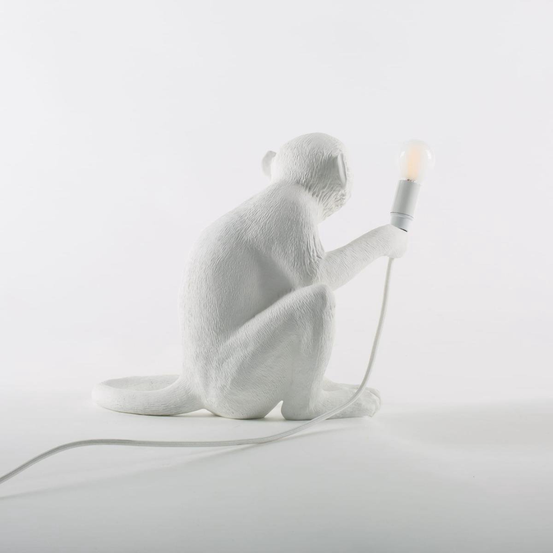 Monkey seated table lamp
